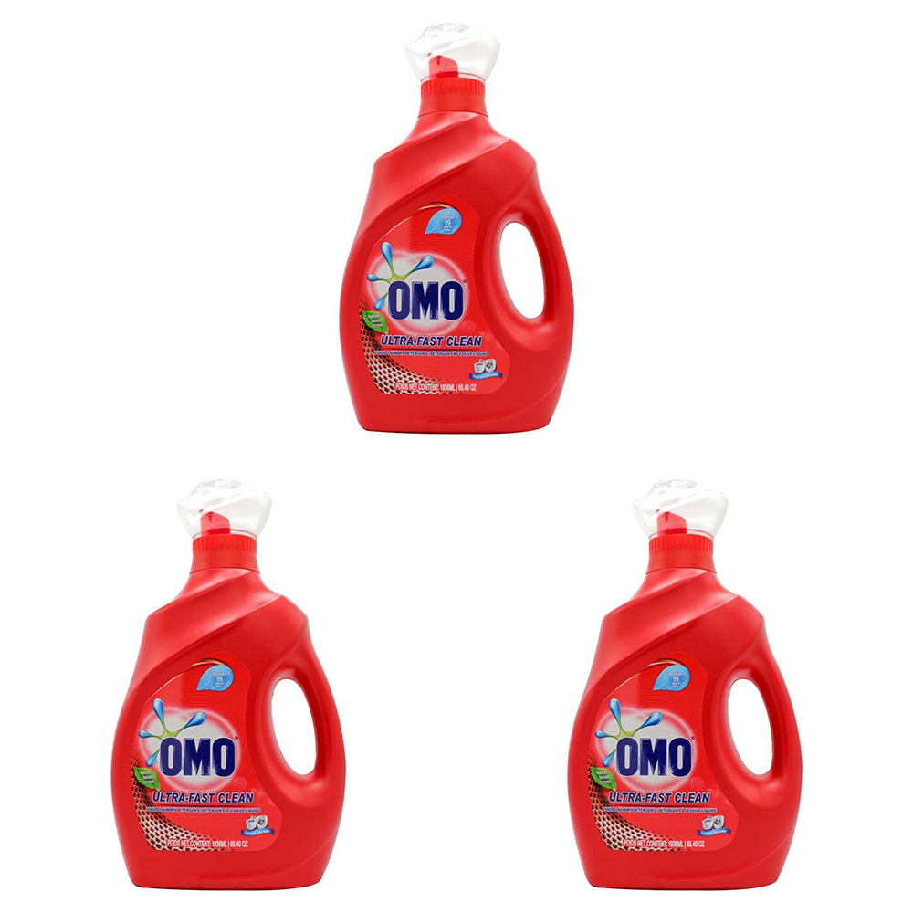 Three bottles of Omo laundry detergent